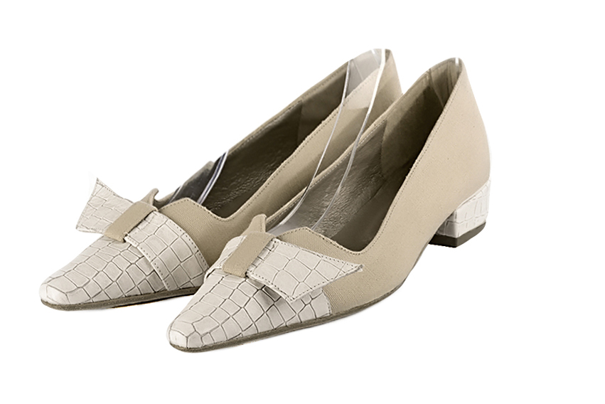 Off white and sand beige women's dress pumps, with a knot on the front. Tapered toe. Low block heels. Front view - Florence KOOIJMAN